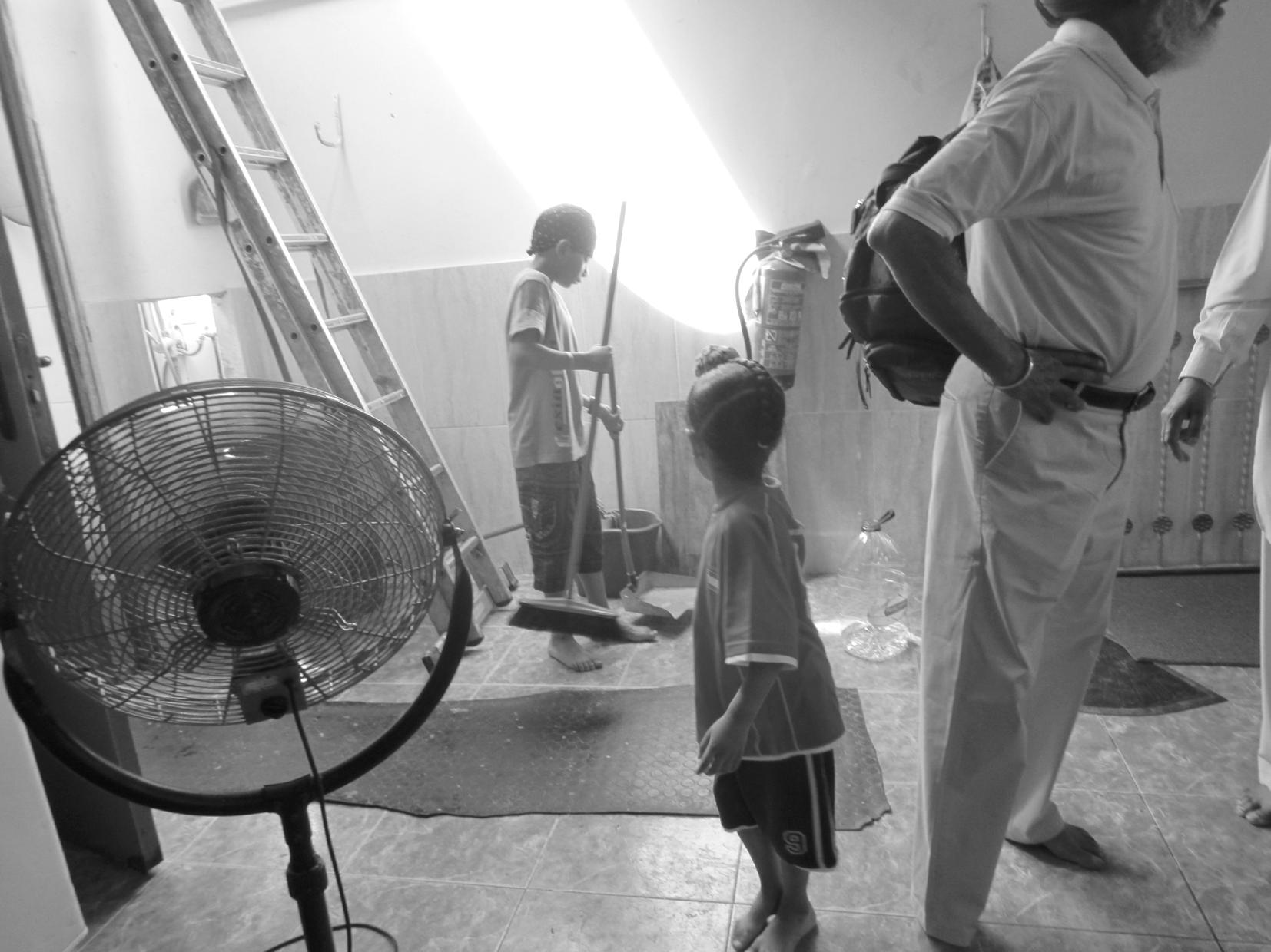 Sikh children learning to do sewa, Barcelona Gurdwara Gurdarshan Sahib